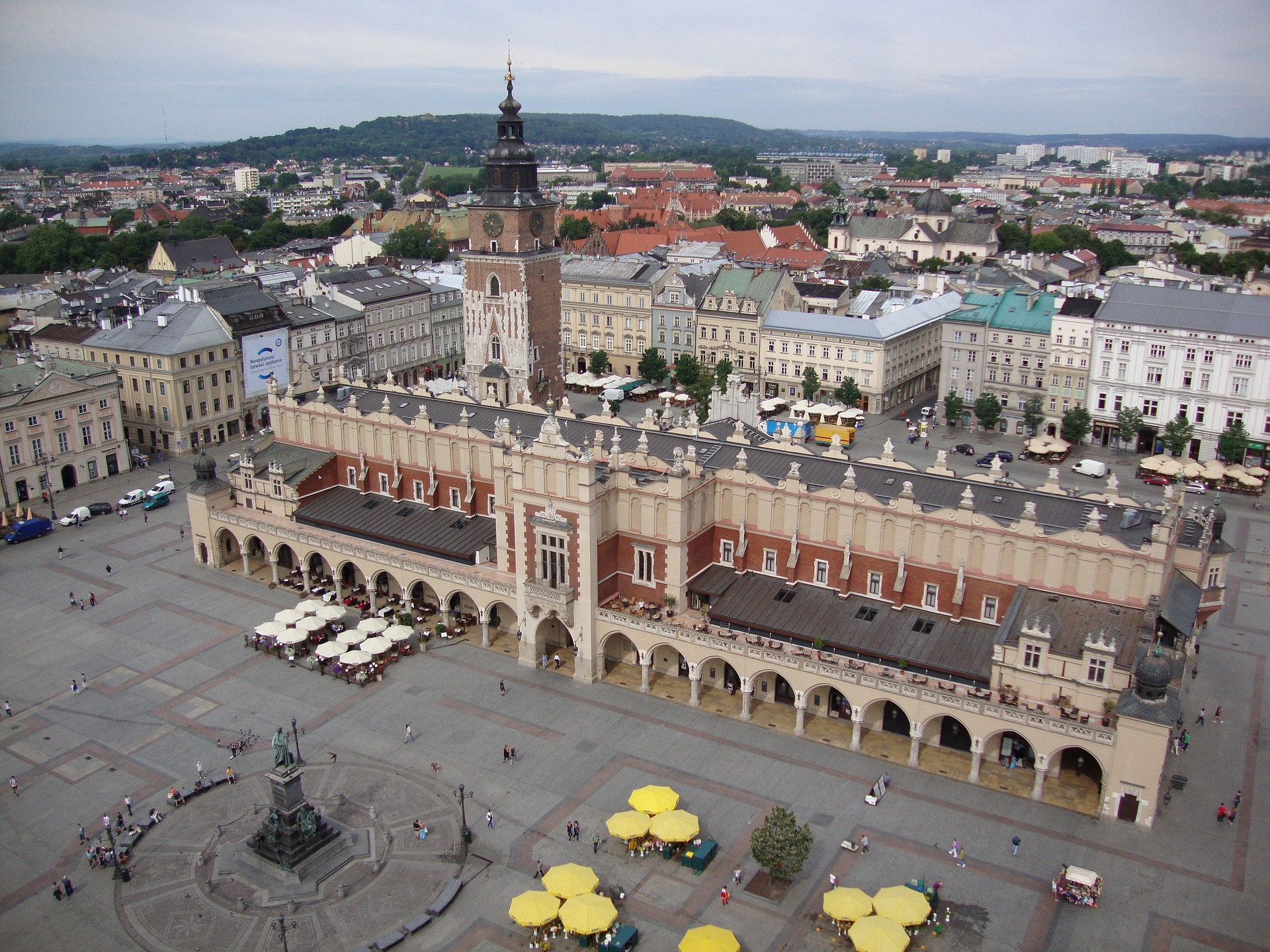 Rows of colorful and intricately designed buildings lining the streets of Krakow, Poland, capturing the city's architectural beauty and historical significance