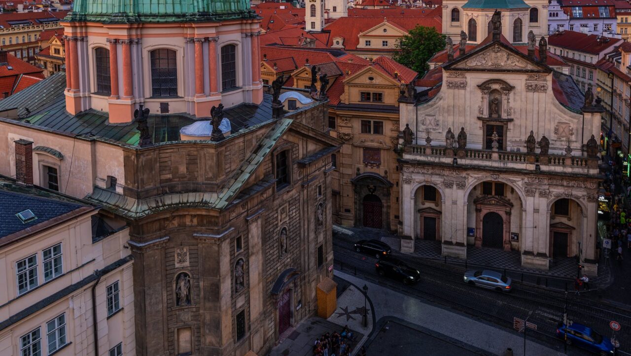 Prague Christmas Markets Bliss | Skyline view of Prague city buildings showcasing historic architecture and cultural charm.