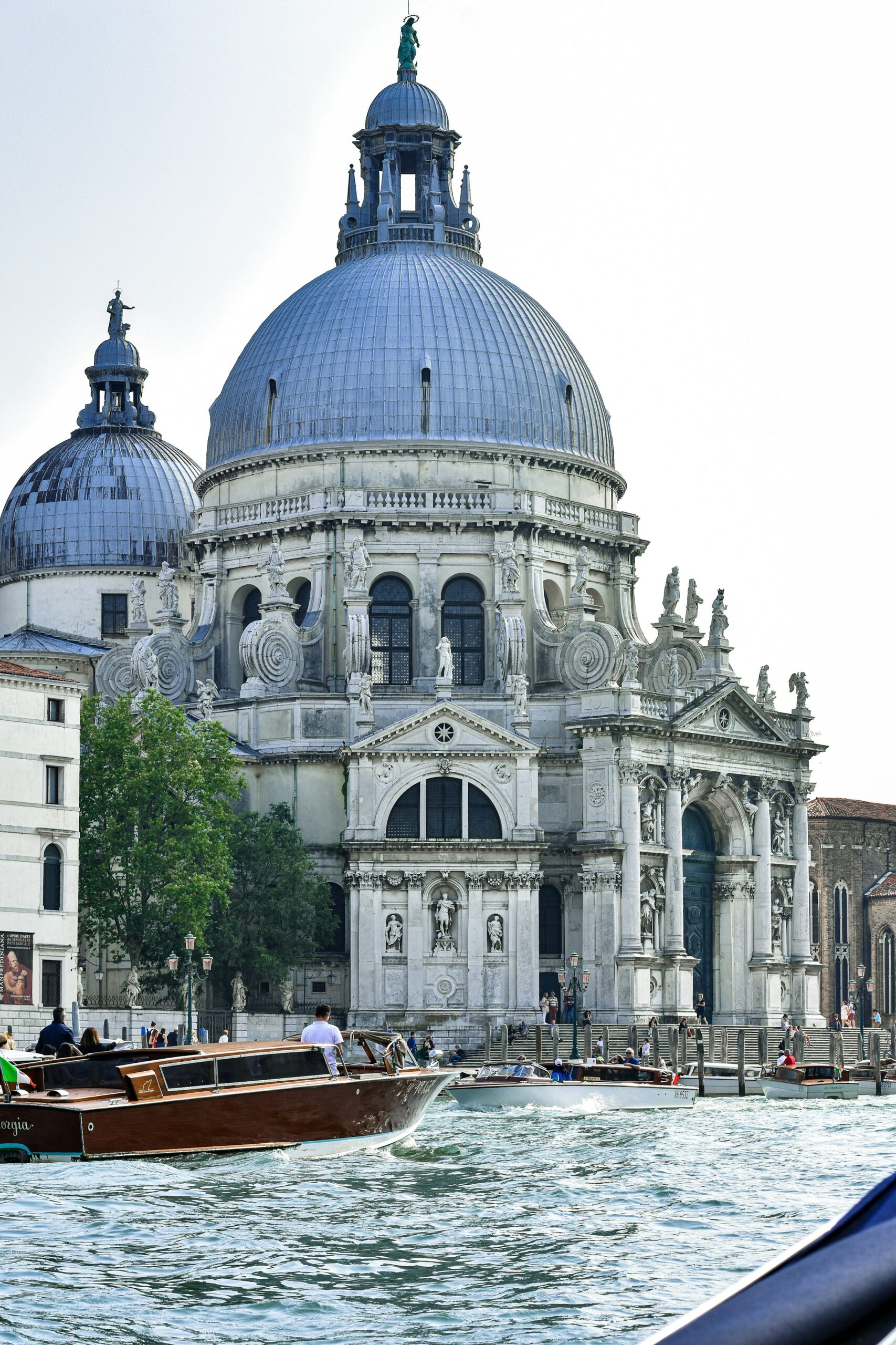 Image showcasing Venice's Floating Beauty: Gondolas on serene canals